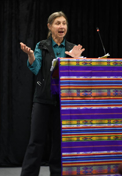 Cynthia at podium